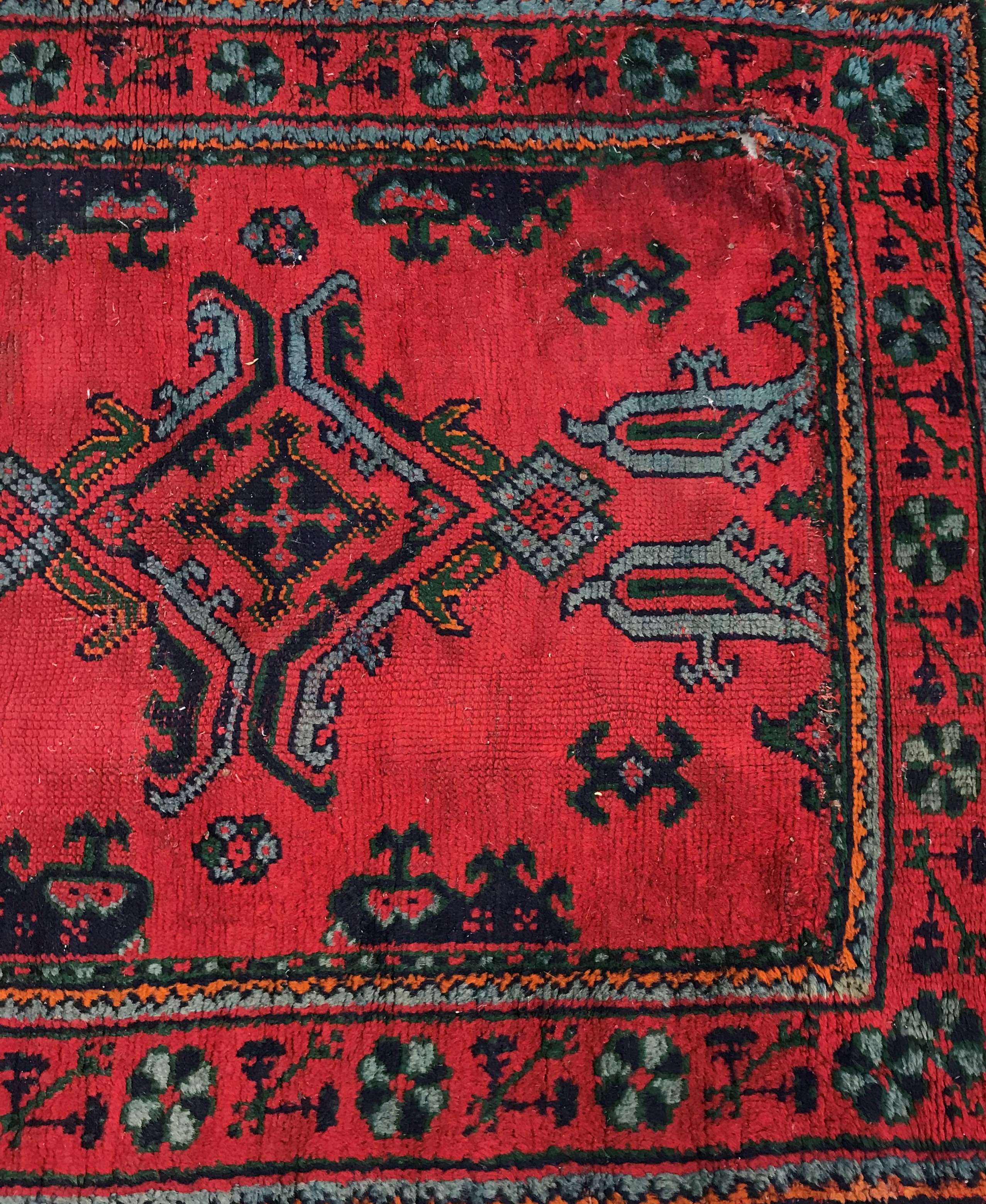 A Donegal style runner, the central panel set with repeating geometric design on a red ground, - Image 6 of 18