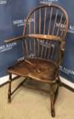 A 19th Century West Country ash and elm stick back elbow chair with D shaped saddle seat on turned