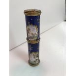 A 19th Century enamel decorated two section telescope with landscape and figural decoration opening