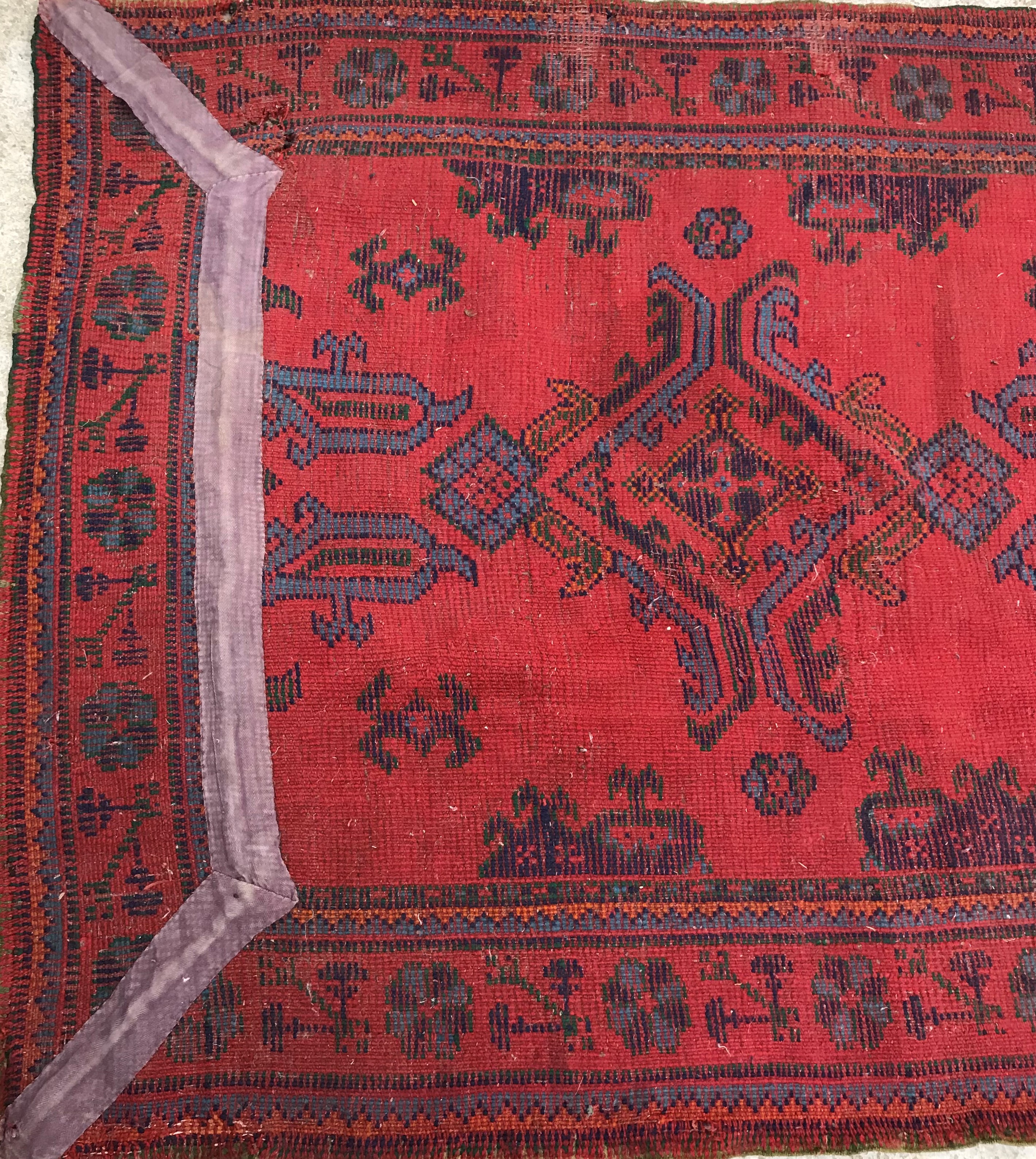 A Donegal style runner, the central panel set with repeating geometric design on a red ground, - Image 8 of 18