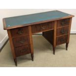 WITHDRAWN A Victorian mahogany kneehole desk,