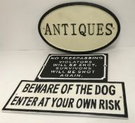 A modern painted cast iron sign inscribed 