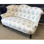 A modern George Smith salon settee, the curved back with scroll arms,