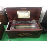 A Ducommun musical box, lever wound, hidden drum/bell, 8 airs as listed, no governor,