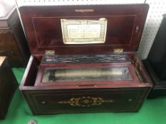 A Ducommun musical box, lever wound, hidden drum/bell, 8 airs as listed, no governor,