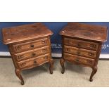 A pair of modern oak bedside chests in the Louis XV taste,