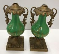 A pair of 19th Century green glass gilt decorated gas lamp bases of baluster form with metal mounts