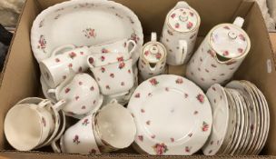 A Royal Doulton rose decorated part tea set to include cups, saucers, side plates,