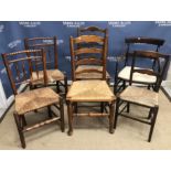 A pair of 19th Century beech and ash framed rush seat spindle back chairs,