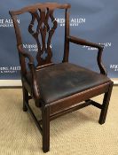 A 19th Century mahogany framed Chippendale style carver chair with swept open arms on square