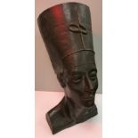 A modern cast bust of Nefertiti with bronzed effect,
