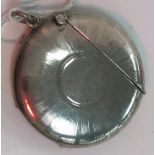 An Edwardian silver Vesta case of circular form with sunburst engraved decoration (by Horace
