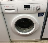 A Bosch Maxx 6 washing machine together with a Hotpoint Reversomatic Dryer Deluxe tumble dryer