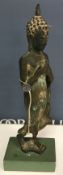 A Thai verdigris patinated bronze figure of a standing Buddha,