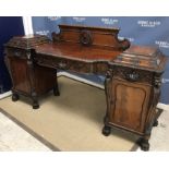 A mahogany Classical Revival breakfront sideboard,