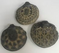 Seven 20th Century Native American sgraffito blackware pottery ocarina type wind instruments