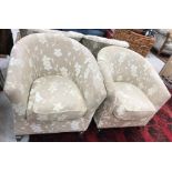 A pair of faun and white floral upholstered tub chairs by/for DFS on square tapered front legs 80