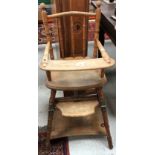 A circa 1900 stained beech framed child's metamorphic high chair of simulated bamboo form,