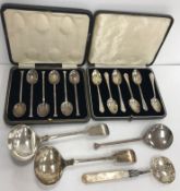 A collection of small silver wares to include a pair of Edwardian "Fiddle" pattern sauce ladles (by