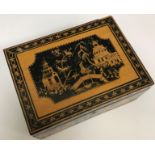 A late 19th/early 20th Century Indian wooden box with painted decoration depicting polo players to