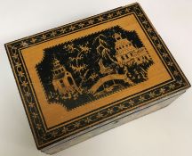 A late 19th/early 20th Century Indian wooden box with painted decoration depicting polo players to