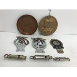 A collection of various automobilia and other items including three car badges "The Order of the