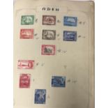 An album of various British and World stamps including several pages of George V Silver Jubilee,