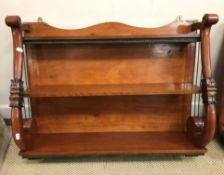 A pair of 20th Century mahogany hanging wall shelves in the William IV manner,