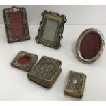 Four miniature silver mounted photograph frames,