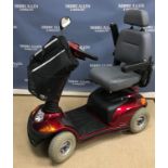 A Landlex Broadway RS-S400X mobility scooter, metallic red with grey seat,