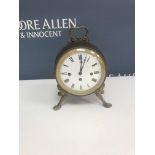 A 19th Century French drum clock with brass embellishments,