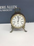 A 19th Century French drum clock with brass embellishments,