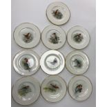 A set of ten Royal Worcester cabinet plates each decorated with hand painted figure of bird amongst