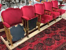 Five vintage inter-connected gold painted cast iron framed cinema seats,