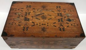 A 19th Century mahogany and parquetry inlaid lozenge and star decorated writing slope with fitted