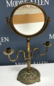 A circa 1900 brass shaving mirror,