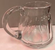 An early 20th Century Baccarat glass jug with slab cut sides, 13.