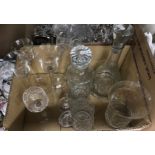 A collection of glassware to include decanters, a Laura Ashley home hurricane style lamp,
