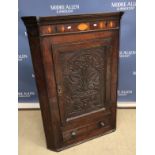 A 19th Century oak hanging corner cupboard,