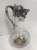 A Victorian silver mounted glass claret jug,