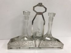 A Swedish Art Deco white metal cruet stand with geometric design bearing stamps "12GR" and "COP"