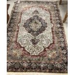 An Oriental carpet,