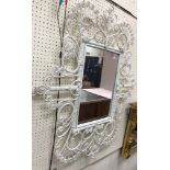 A pair of retro rectangular wall mirrors with white painted cane scrolling frames, 110 cm x 91.