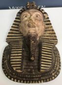 An early to mid 20th Century painted plaster model of Tutankhamun's death mask,