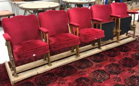 Five vintage inter-connected gold painted cast iron framed cinema seats,