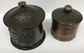 An Arts & Crafts copper circular tea caddy with lift off lid and embossed decoration 13.