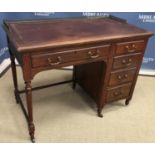 An early 20th Century mahogany framed desk,