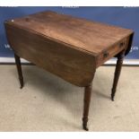 An early Victorian mahogany pembroke table,