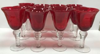 A set of twelve ruby and clear glass goblets,
