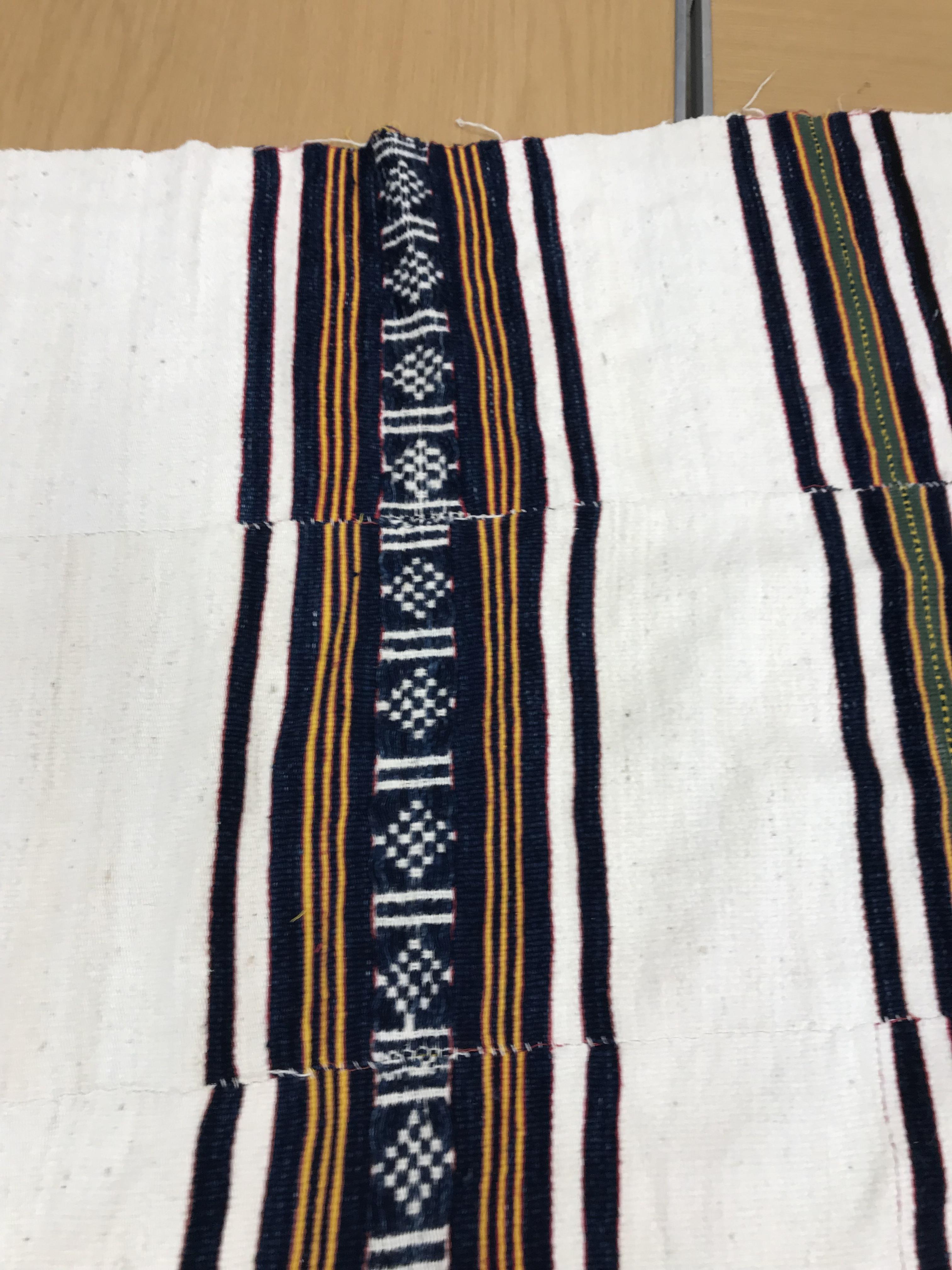 A mid 20th Century Fulani blanket in cream with blue and yellow stripes constructed of hand woven - Image 13 of 18